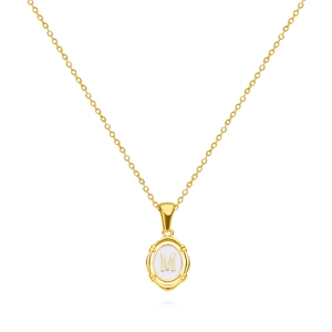 Detailed macro of gold oval pendant featuring a white center with the letter M