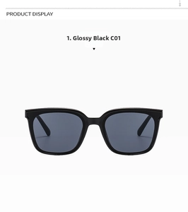Detail of glossy black square frames with dark gray lenses for UV sun protection