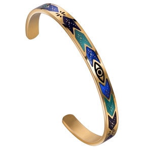 Retro stainless steel gold bracelet with colorful enamel eyes and zircon accents