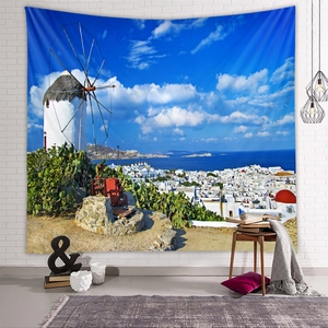 Detail view of Santorini tapestry featuring white windmills and Mediterranean landscape decor