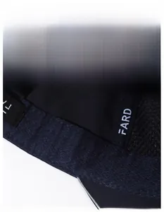 Detail of wide moisture-wicking sweatband and breathable mesh lining on baseball cap