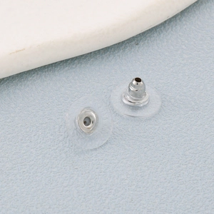 Surgical stainless steel and silicone UFO earring backs for secure jewelry making