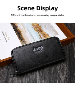 Detailed view of black textured leather long wallet with silver zipper on wood