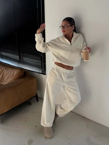 Women's two-piece polar fleece tracksuit set with half-zip sweatshirt and wide-leg joggers
