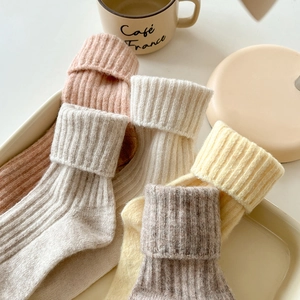 Thick wool blend socks in Morandi earth tones with warm ribbed knit texture for winter