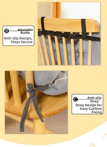Detail of gray chair cushion with adjustable buckle and non-slip straps on wooden chair