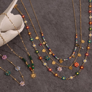 Bohemian gold stainless steel necklaces with colorful beads and floral heart pendants