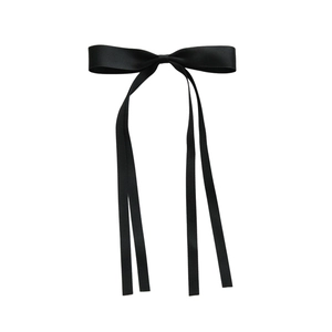 Elegant black satin bow hair clip with long flowing ribbons on a white background