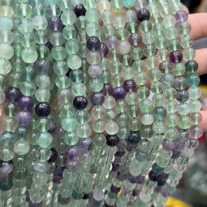 Natural multi-color fluorite round beads with purple and green translucent textures