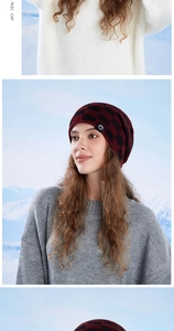 Detail of red and black checkered knit beanie with round logo for winter outdoor wear