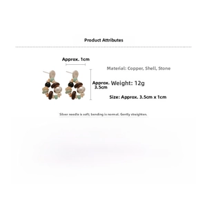 Detail view of Bohemian beaded star earrings featuring shell, stone and silver studs