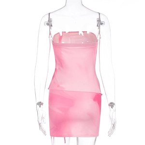 Detail of pink tie-dye tube top and bodycon skirt set with glossy satin texture