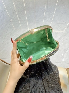Green peacock clutch with gold frame and diamond ball clasp for evening parties