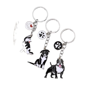 Set of three cute cartoon dog keychains featuring Husky and Border Collie charms