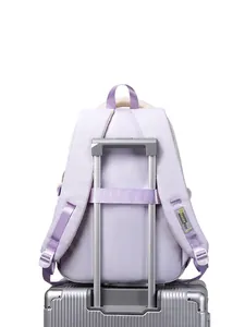 Purple nylon school backpack with suitcase strap and adjustable padded shoulder straps