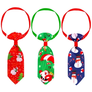 Adjustable Christmas pet ties in red, green and blue ribbed fabric with festive patterns