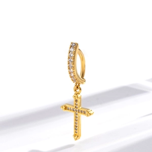 Detailed view of a gold-plated navel ring featuring a sparkling zircon-encrusted cross pendant