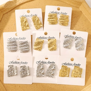 Fashion titanium steel stud earrings set in gold and silver irregular geometric designs