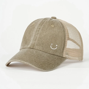 Vintage khaki baseball cap with white smiley face embroidery and breathable mesh back panel