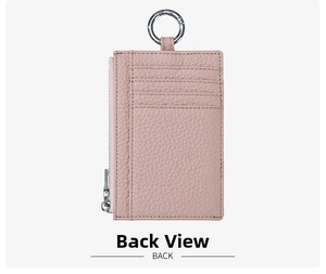 Macro shot of pink litchi grain leather back with card slots and silver hook