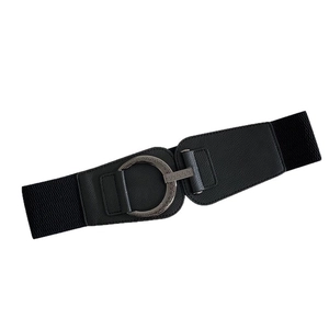 Vintage black elastic waist belt with textured metal circle buckle for elegant dresses
