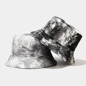 Fashionable tie-dye bucket hats in black and grey patterns for outdoor sun protection