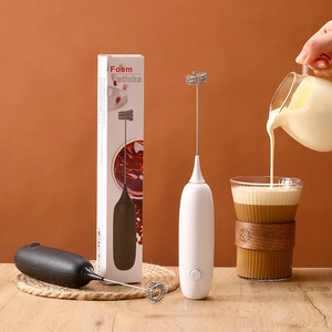 Electric handheld milk frother in black and white finish for coffee and foam