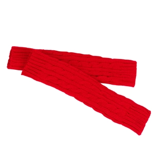 Close-up of red cable knit arm warmers made of soft acrylic yarn with textured pattern