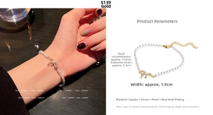 Detail of gold pearl bow bracelet with zircon inlay and adjustable extension chain