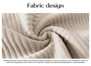 Detail of beige ribbed knit fabric texture with English washing instructions on white