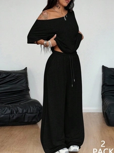 Conjunto de 2 piezas negro para mujer con pantalón de talle alto y top corto