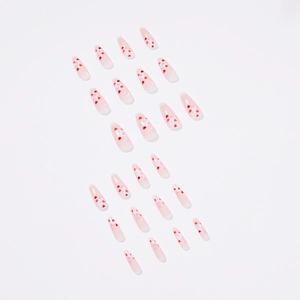 Long coffin press-on nails with pink gradient and red heart patterns in a 24-piece set