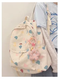 Cute Korean style cartoon print backpack in cream white with colorful patterns for girls