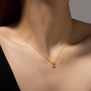 Elegant gold S925 silver necklace featuring a Gemini constellation pendant with white zircon