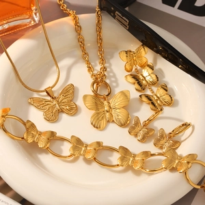 Golden stainless steel butterfly jewelry set with necklaces earrings and bracelet