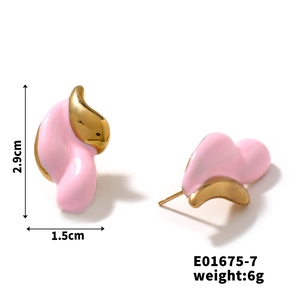 Detail view of pink enamel teardrop earrings with dimensions 2.9cm by 1.5cm and gold finish