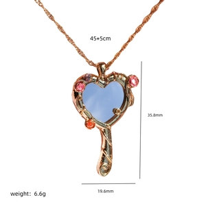 Barbie-style rose gold heart mirror necklace with pink crystals and dimensions 35.8x19.6mm