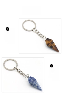 Detail of tiger eye and sodalite conical stone pendants on polished metal keychains