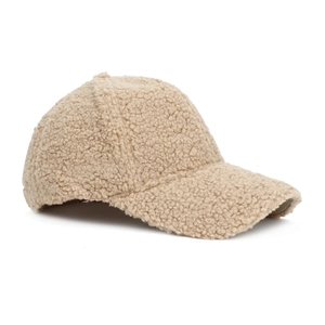Detailed close-up of a warm beige sherpa fleece baseball cap showing soft fuzzy texture