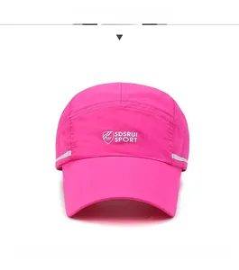 Front detail of pink quick-dry baseball cap with reflective edges and sport logo