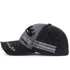 Distressed wash five-panel baseball cap with vintage embroidery and frayed details
