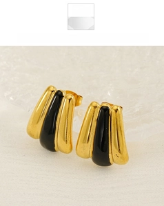 Detail view of gold-plated stainless steel earrings with black enamel inlay design
