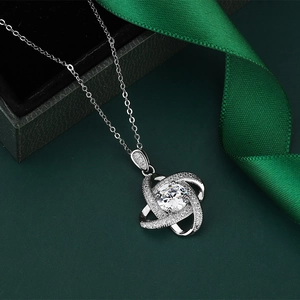 Elegant 2ct silver knot pendant necklace with round zircon in a green gift jewelry box