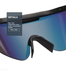Detail of non-slip integrated nose pads on black matte sports sunglasses with yellow speckles