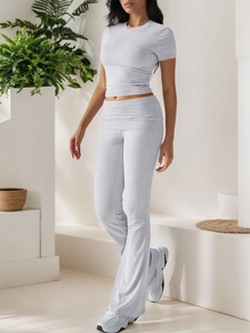 Detail of grey short sleeve tee and flare pants set with subtle knit texture