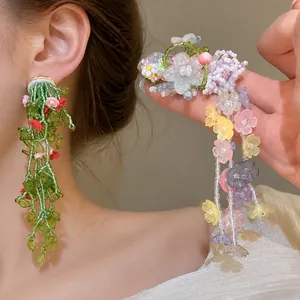 Pendientes colgantes de flores hechos a mano con cuentas de cristal y plata 925.