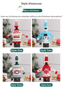 Detail of four festive knitted wine bottle covers with holiday patterns and mini hats
