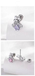 Macro view of cartoon rabbit earring with star zircon and secure screw back closure