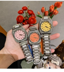 Detailed view of Dinimi octagonal steel band quartz watches in three vibrant dial colors.