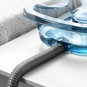 Portable blue bed shampoo basin for elderly with flexible drainage hose attachment